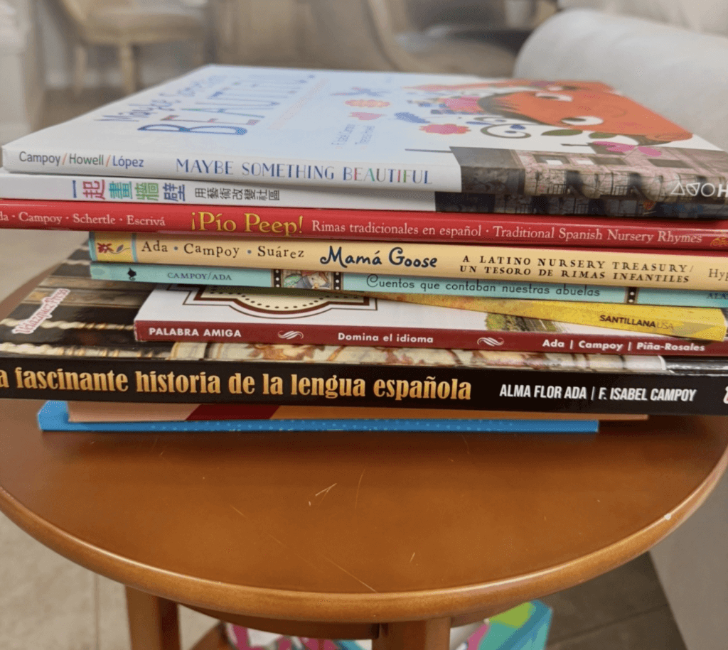 Stack of books written by Dr. Alma Flor Ada.